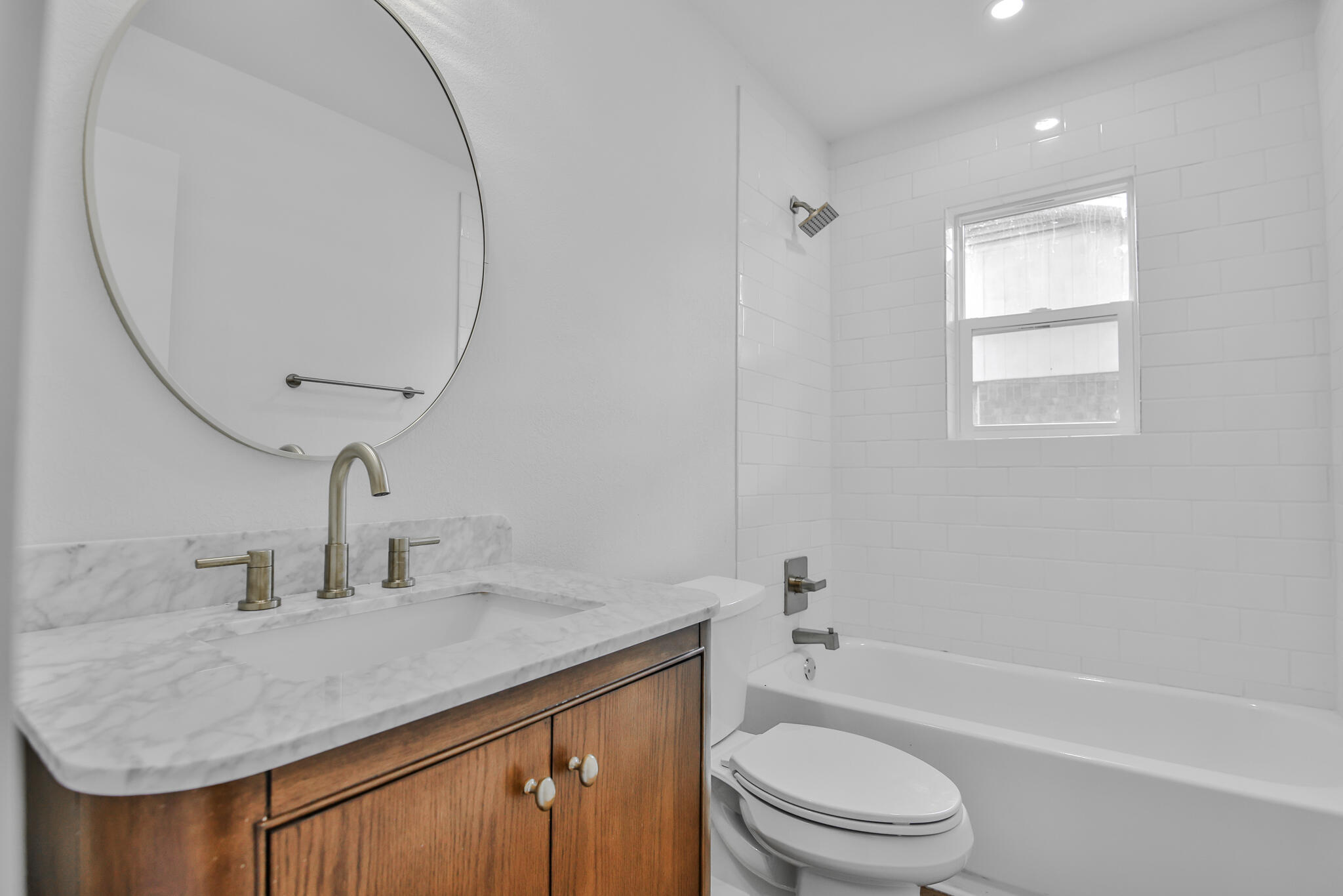 2620 78th Street Lubbock, TX 79423 - Photo 23 of 27 a bathroom with a sink a toilet and shower