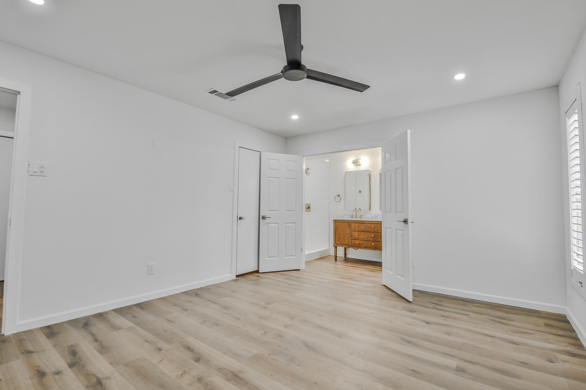 2620 78th Street Lubbock, TX 79423 - Photo 9 of 27 a view of an empty room with a window