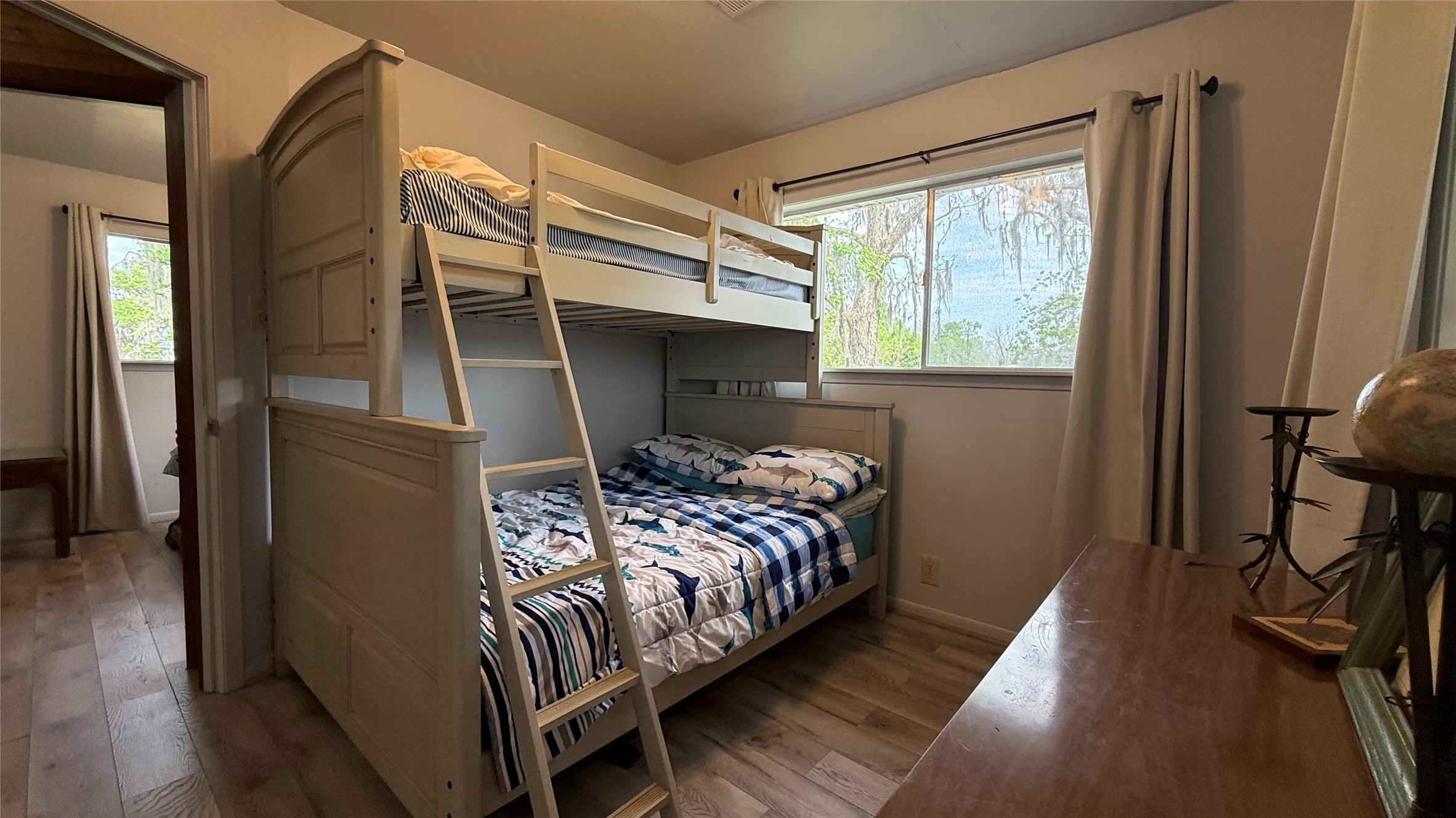 215 Weldon Livingston, TX 77351 - Photo 20 of 22 a bedroom with a bed and a window