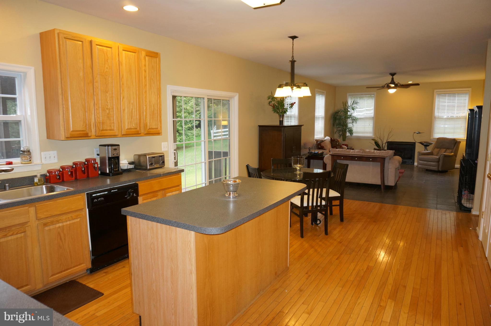 15090 Frederick Road Woodbine, MD 21797 - Photo 11 of 30 Kitchen to Family Room