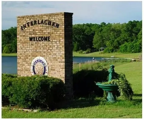 a view of a lake with a building in the background