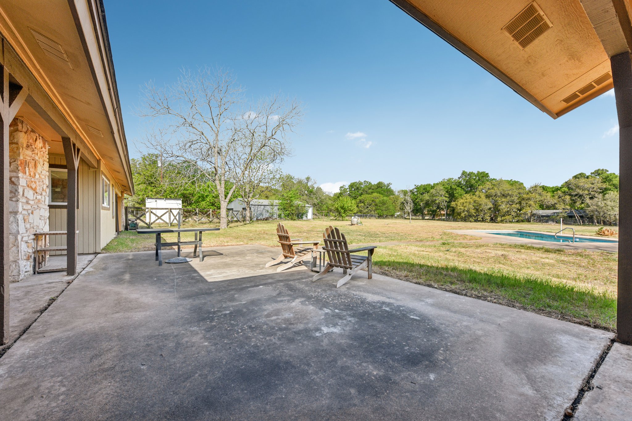 504 Buckaroo Trail Buda, TX 78610 - Photo 25 of 39 View of patio / terrace featuring an outdoor pool
