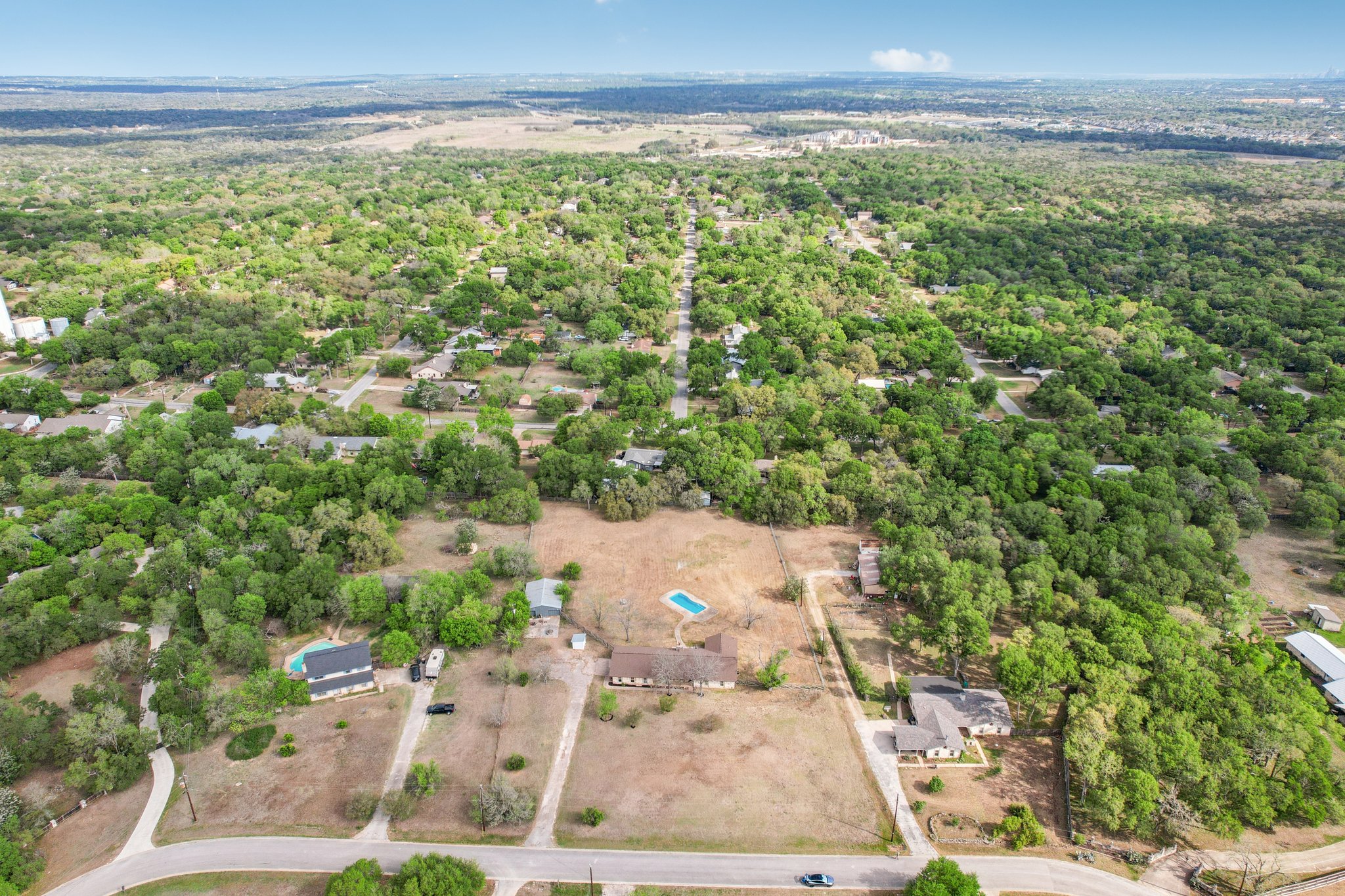 504 Buckaroo Trail Buda, TX 78610 - Photo 29 of 39 Bird's eye view of a heavily wooded area