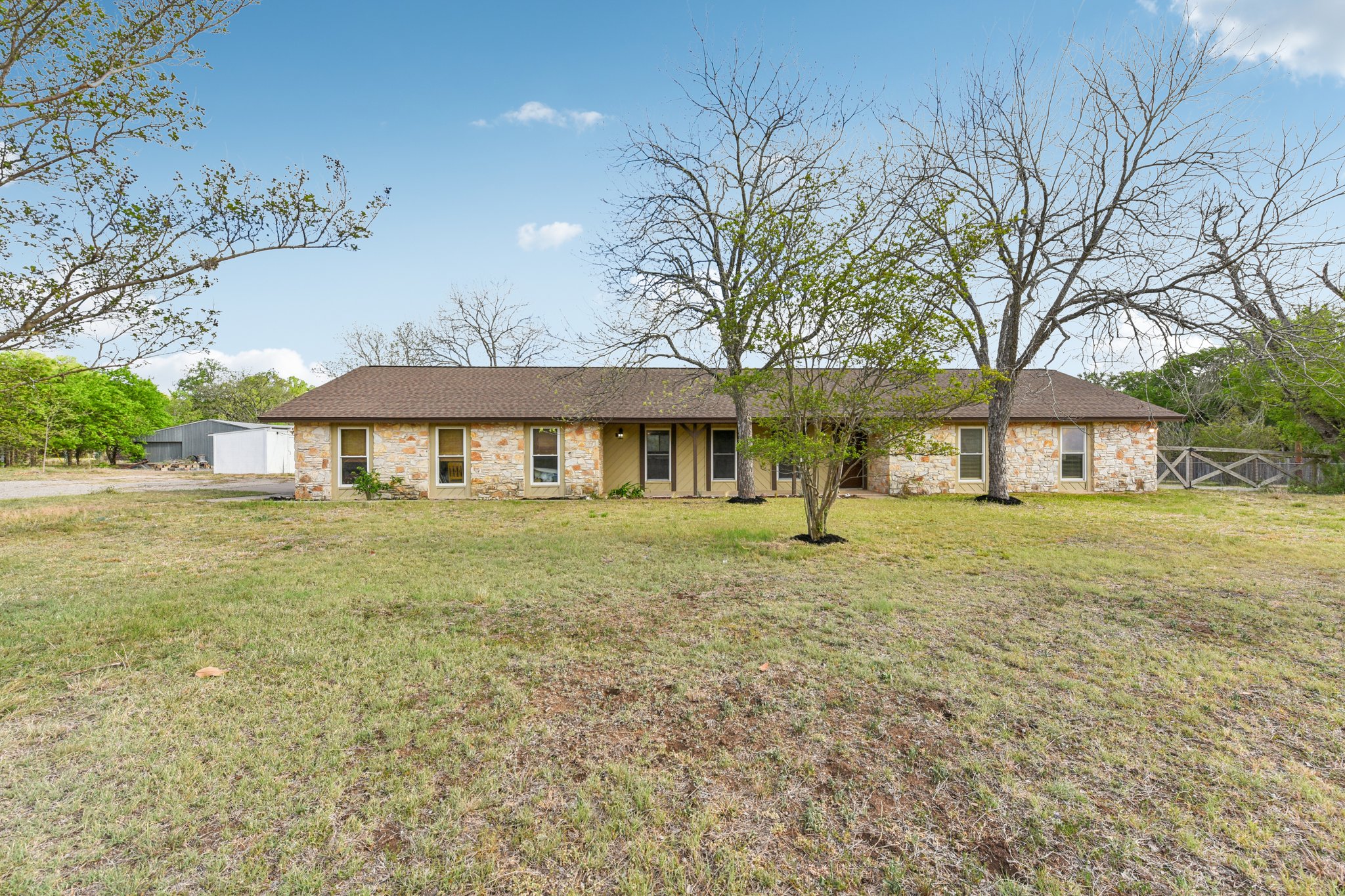 504 Buckaroo Trail Buda, TX 78610 - Photo 37 of 39 Ranch-style house with a front yard
