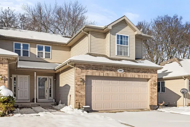 a front view of a house with yard