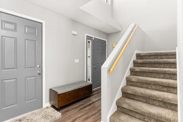 a view of staircase with white walls and white walls