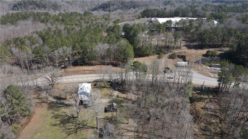 3228 Highway 53 Jasper, GA 30143 - Photo 4 of 16 a view of a yard with trees