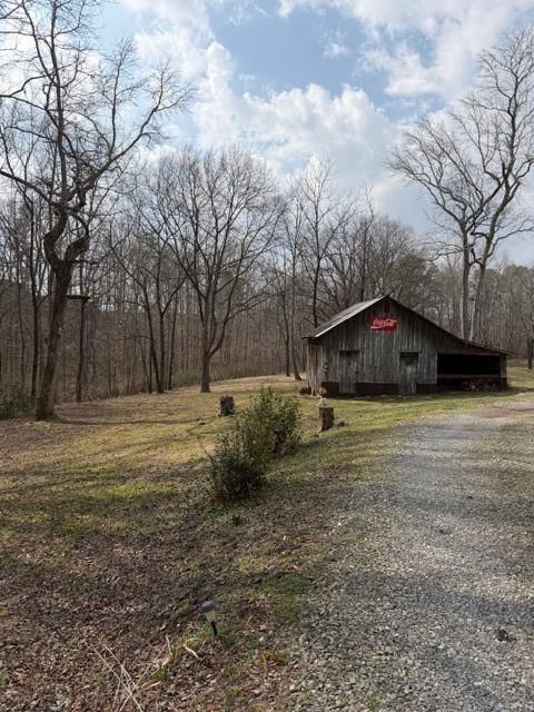 3228 Highway 53 Jasper, GA 30143 - Photo 8 of 16 a house view with yard