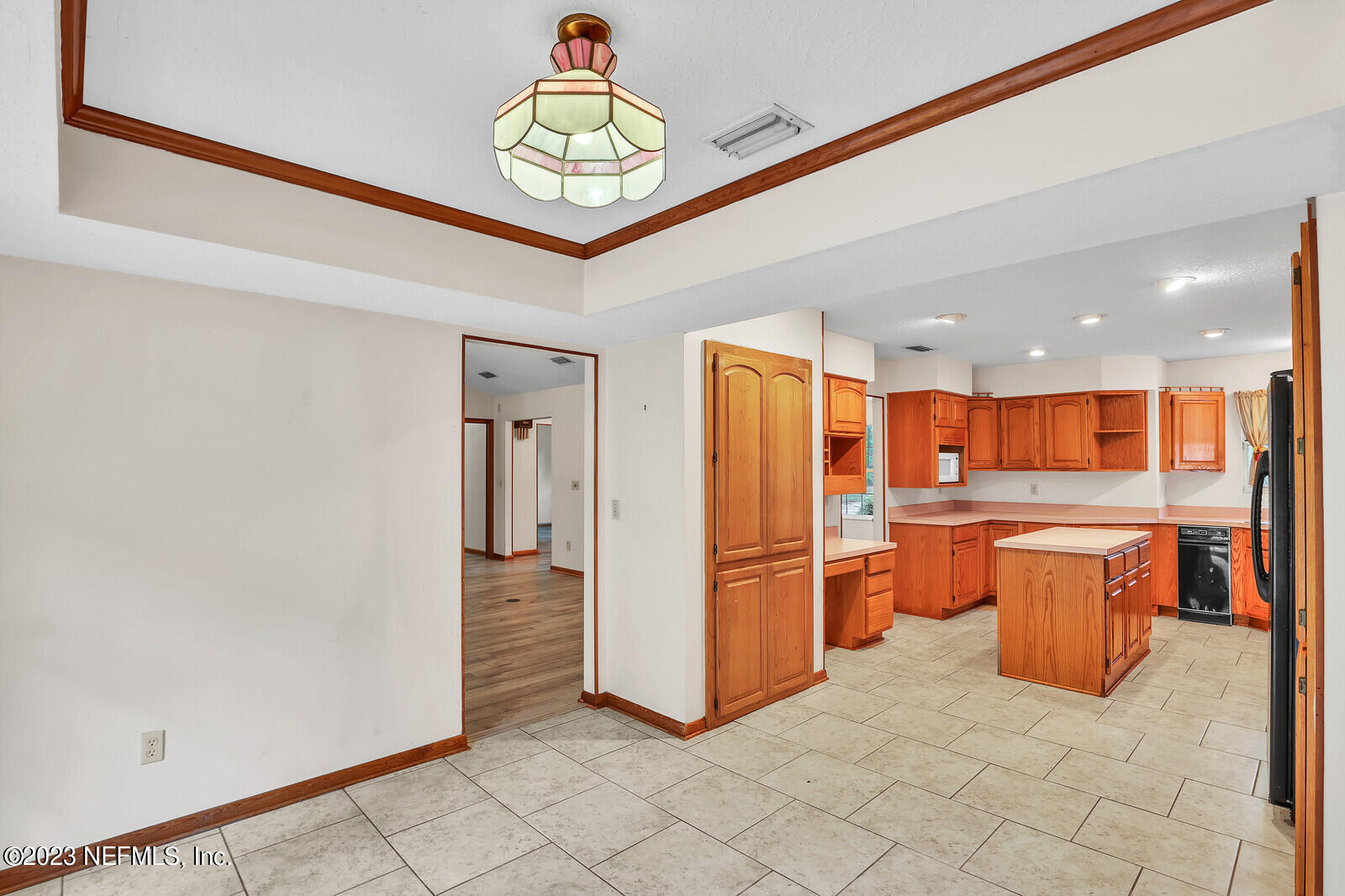 4250 Banks Road Middleburg, FL 32068 - Photo 24 of 48 a view of kitchen with stainless steel appliances granite countertop a refrigerator and a stove top oven