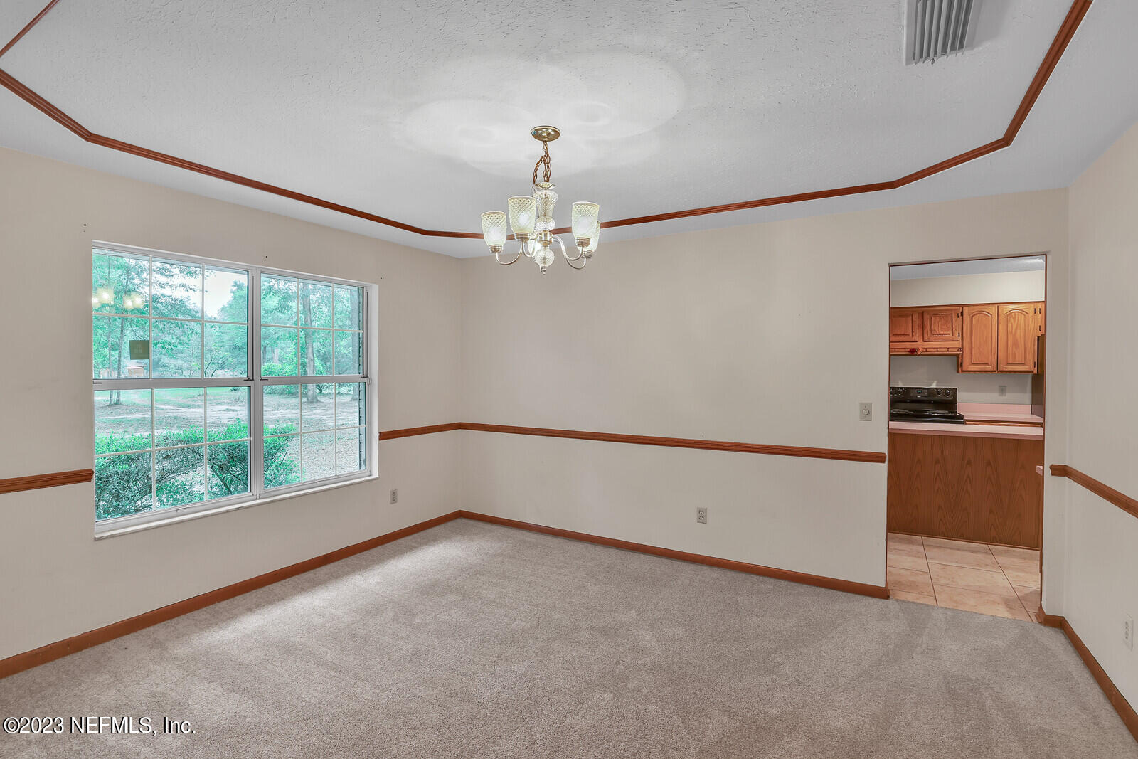 4250 Banks Road Middleburg, FL 32068 - Photo 37 of 48 a view of a livingroom with a ceiling fan and window