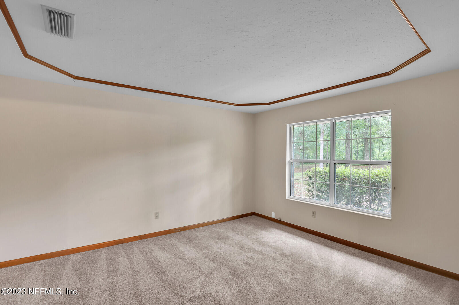4250 Banks Road Middleburg, FL 32068 - Photo 38 of 48 a view of a big room with windows and chandelier fan