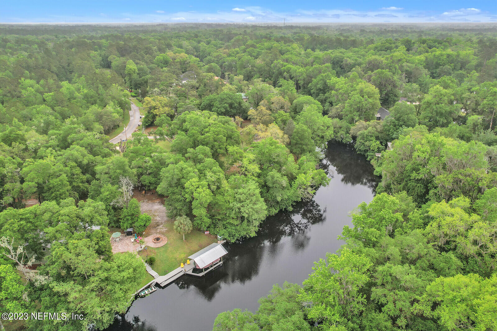 4250 Banks Road Middleburg, FL 32068 - Photo 41 of 48 a view of a lake with a forest