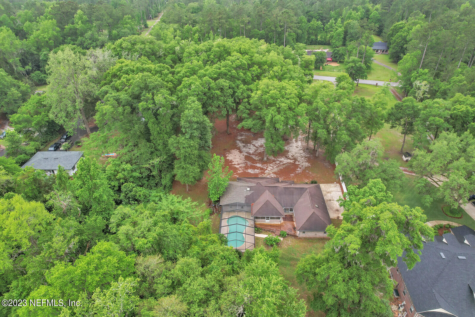 4250 Banks Road Middleburg, FL 32068 - Photo 44 of 48 an aerial view of a house with a yard