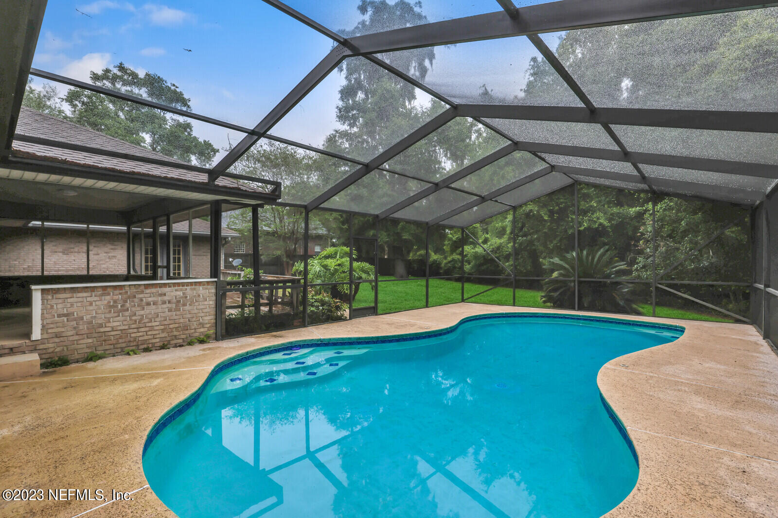 4250 Banks Road Middleburg, FL 32068 - Photo 47 of 48 a view of a swimming pool with a patio