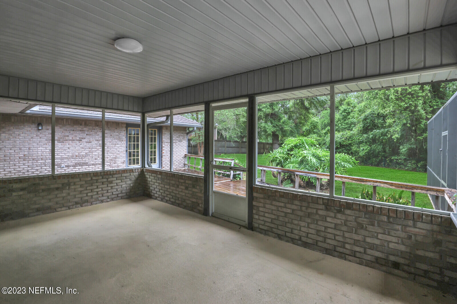 4250 Banks Road Middleburg, FL 32068 - Photo 7 of 48 a view of an empty room with a balcony