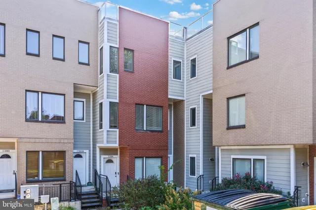 a front view of a multi story residential apartment building