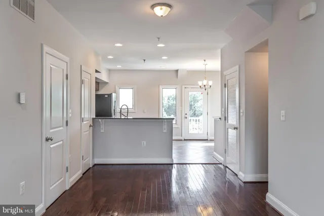 a view of large windows in a kitchen