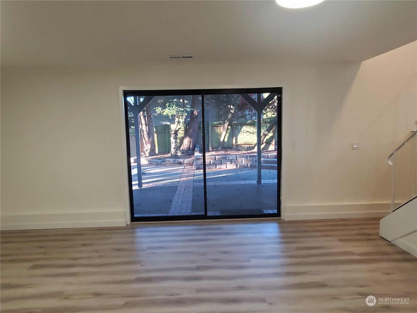 2606 Southwest 340th Place Federal Way, WA 98023 - Photo 16 of 28 a view of a livingroom with wooden floor