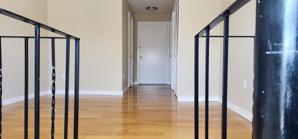 1 Samoset Avenue, Unit WINTER Mansfield, MA 02048 - Photo 5 of 7 a view of entryway with wooden floor