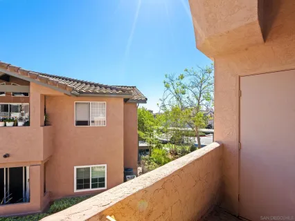 a view of a balcony with an outdoor space