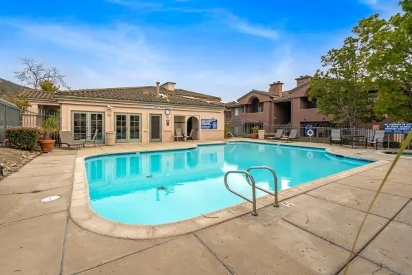 a view of a house with a swimming pool
