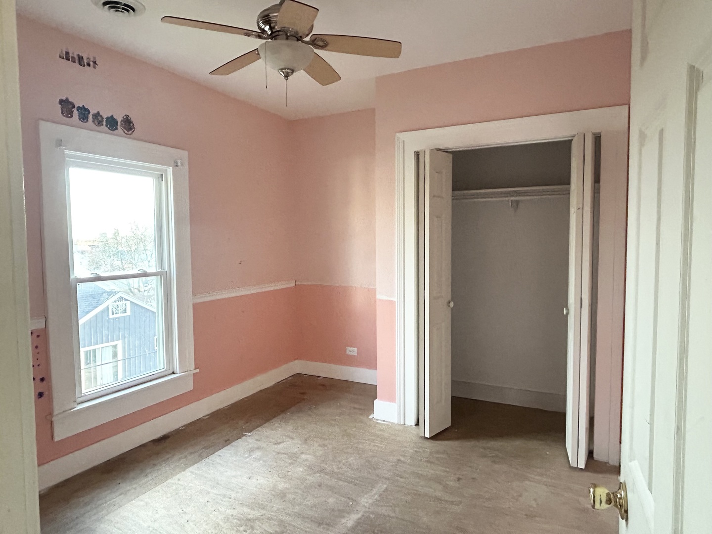 104 Grant Street Harvard, IL 60033 - Photo 11 of 14 a view of an empty room with a window