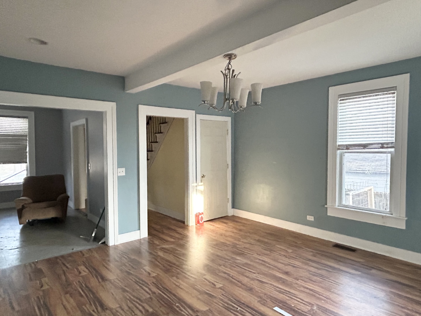 104 Grant Street Harvard, IL 60033 - Photo 6 of 14 a view of livingroom with hardwood floor and window