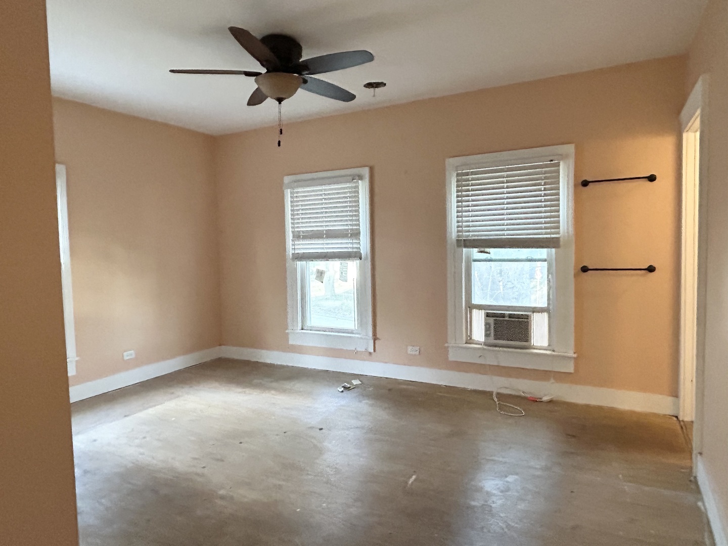 104 Grant Street Harvard, IL 60033 - Photo 8 of 14 a view of an empty room with a window
