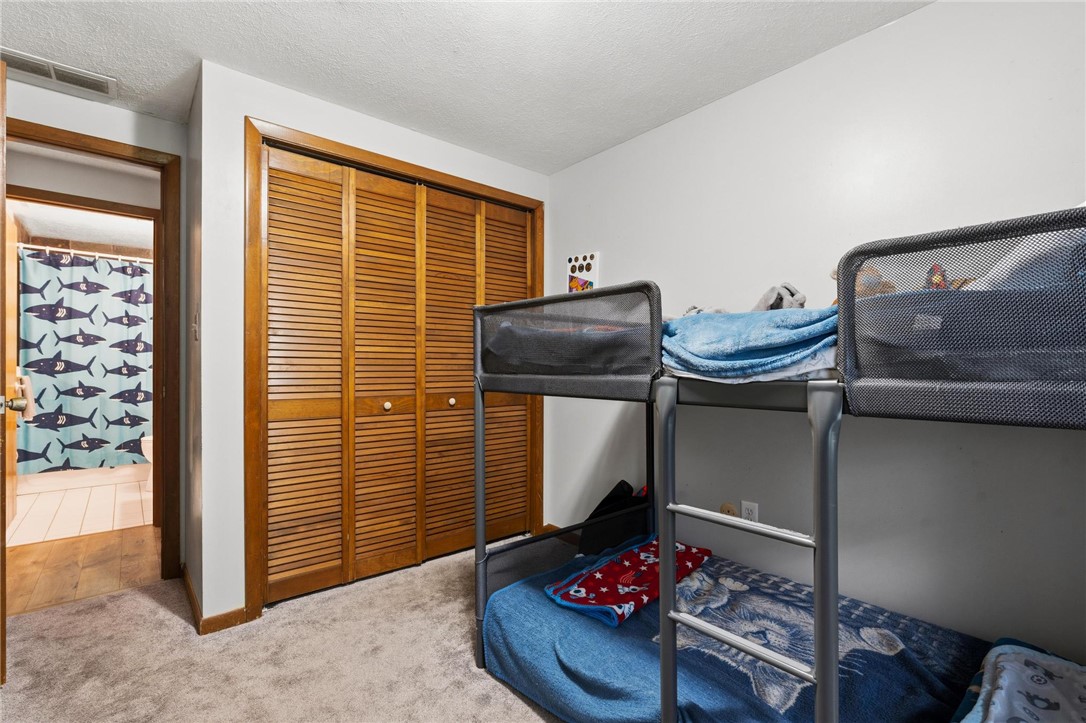 1940 Armstrong Road Fairborn, OH 45324 - Photo 31 of 48 This spacious bedroom offers comfortable accommodations with easy access to a full bathroom.
