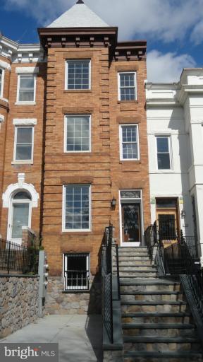 a front view of a house with more windows