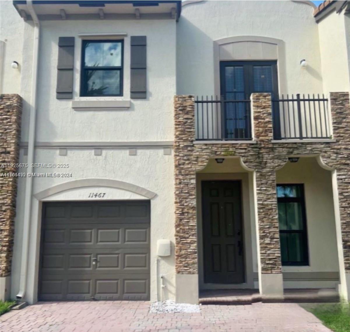 11467 Southwest 238th Street Homestead, FL 33032 - Photo 1 of 16 a view of house with entryway