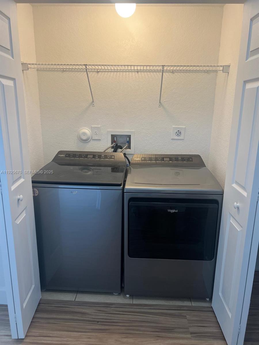 11467 Southwest 238th Street Homestead, FL 33032 - Photo 10 of 16 a utility room with washer and dryer