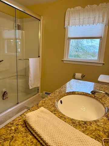 an empty room with a windows