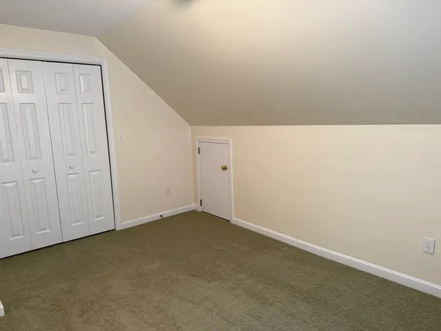 a bathroom with a sink toilet and mirror