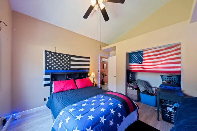 aerial view of a house with a yard