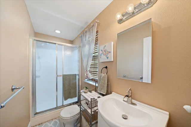 a view of a big yard with large trees