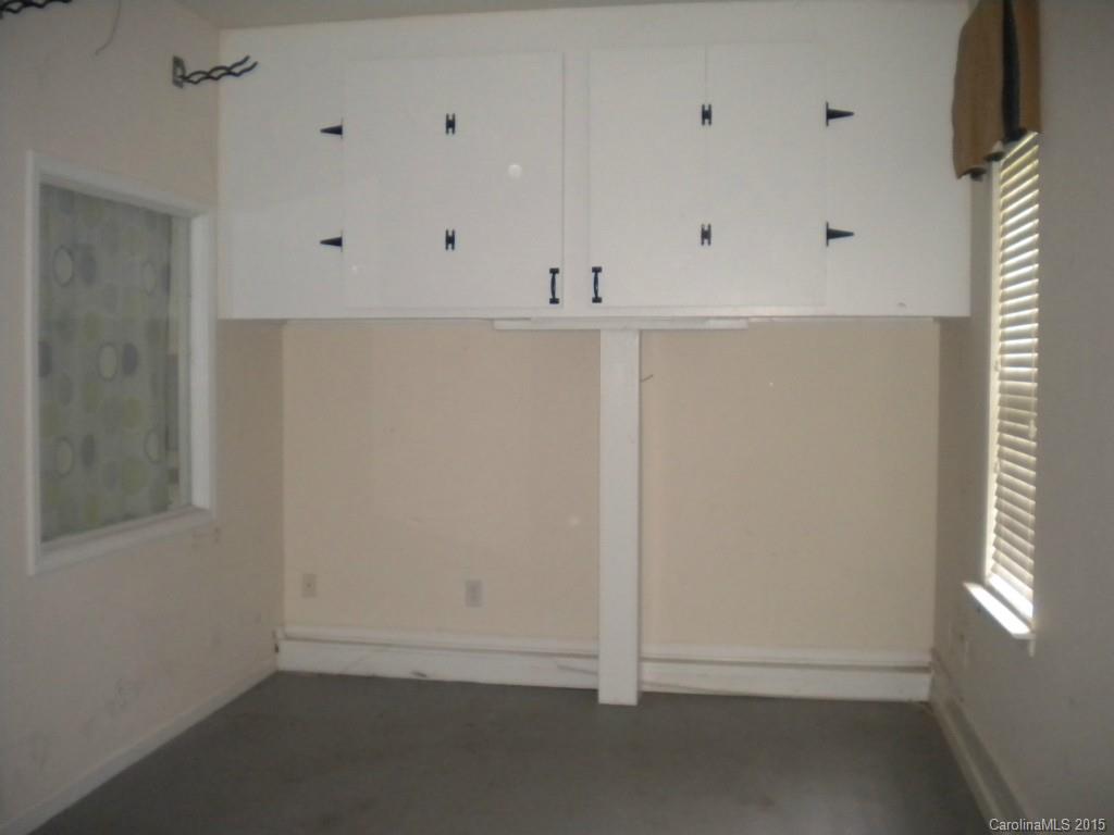 2309 Hargett Road Matthews, NC 28105 - Photo 14 of 24 a view of an empty room with a window
