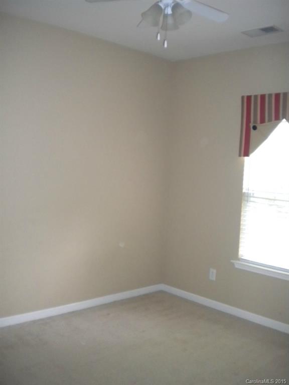2309 Hargett Road Matthews, NC 28105 - Photo 21 of 24 an empty room with a window