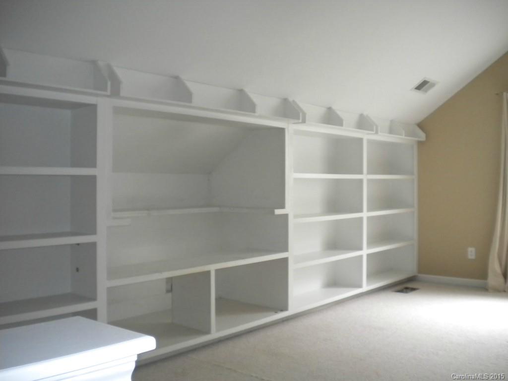 2309 Hargett Road Matthews, NC 28105 - Photo 23 of 24 a view of an empty room with empty racks