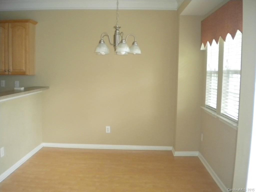 2309 Hargett Road Matthews, NC 28105 - Photo 9 of 24 a view of an empty room with a window