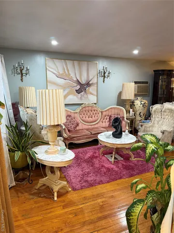 a living room with furniture and a rug