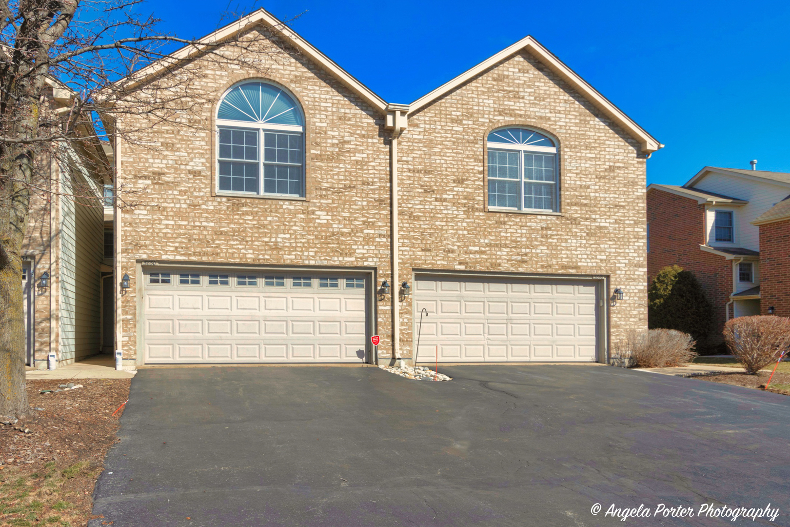 5850 Fieldstone Trail McHenry, IL 60050 - Photo 1 of 28 a front view of a house with a garage