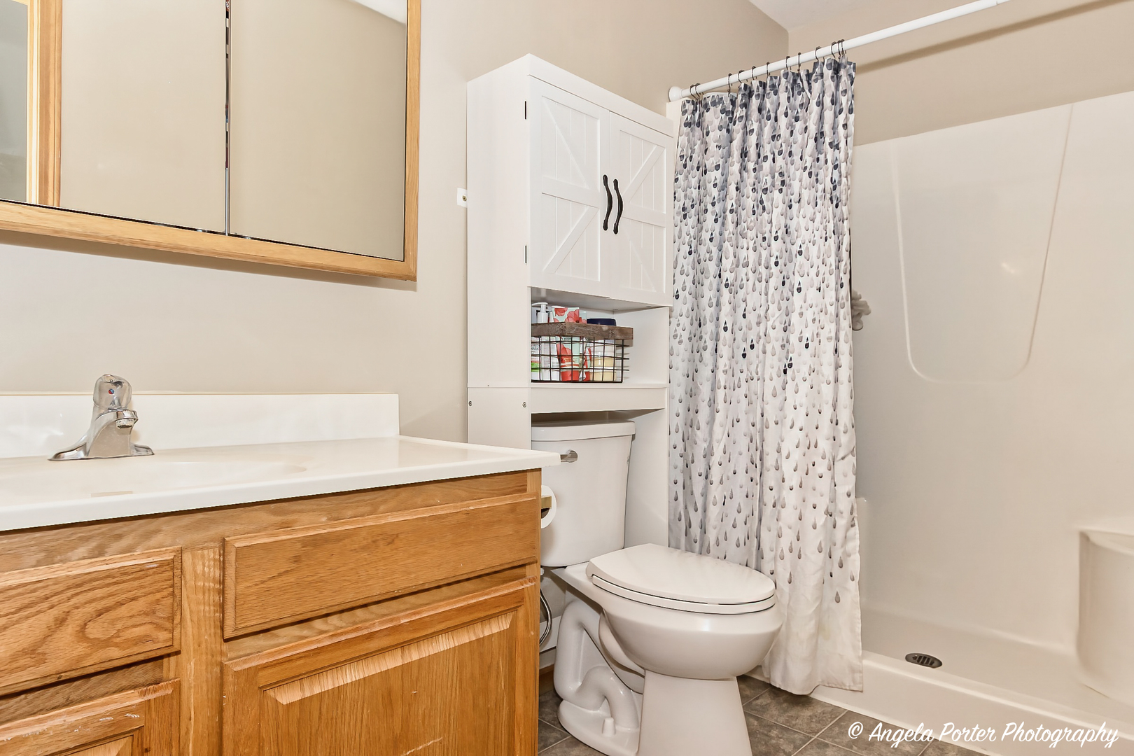 5850 Fieldstone Trail McHenry, IL 60050 - Photo 16 of 28 a bathroom with a sink a toilet and shower