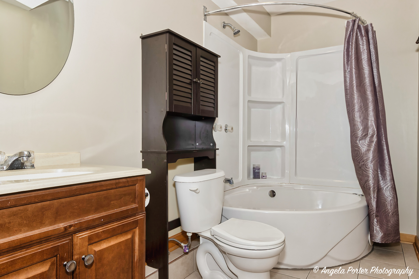5850 Fieldstone Trail McHenry, IL 60050 - Photo 25 of 28 a bathroom with a sink a toilet and a bathtub