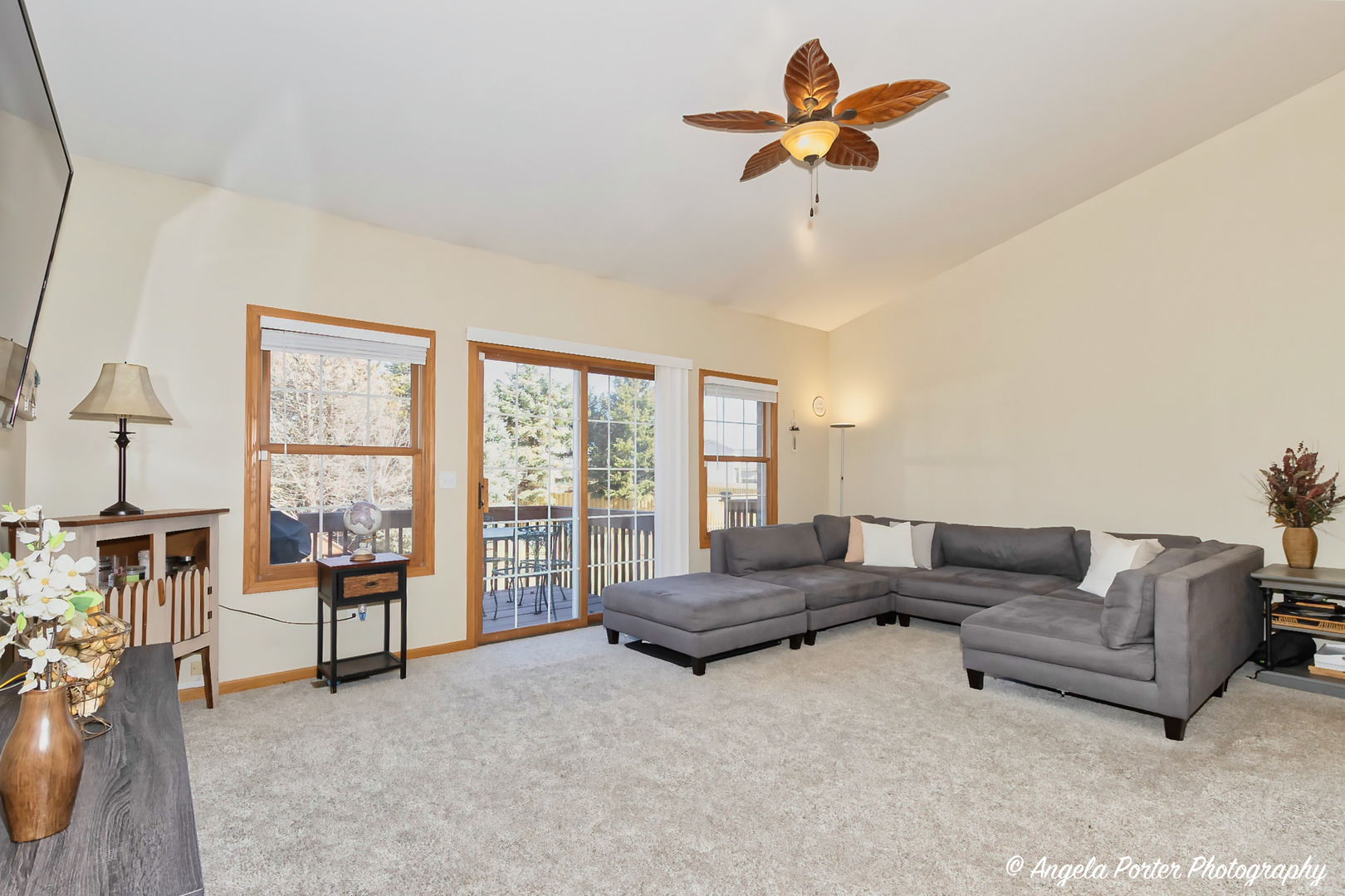 5850 Fieldstone Trail McHenry, IL 60050 - Photo 5 of 28 a living room with furniture and a large window