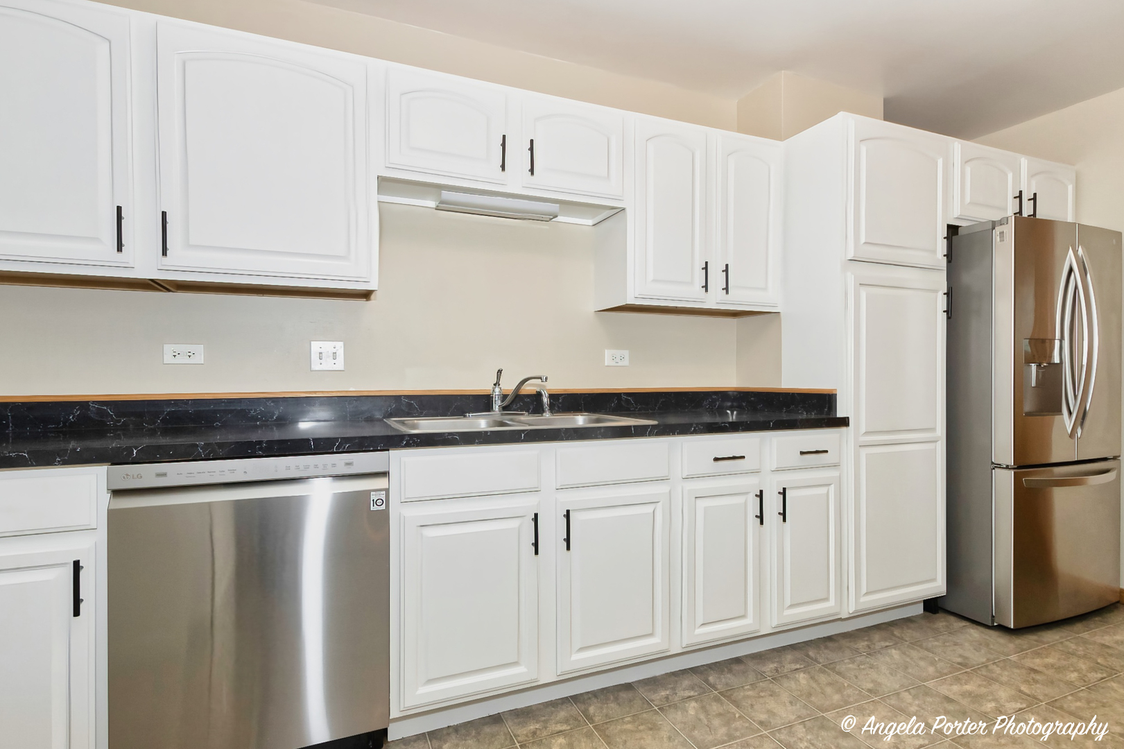 5850 Fieldstone Trail McHenry, IL 60050 - Photo 8 of 28 a kitchen with granite countertop white cabinets white stainless steel appliances and a sink