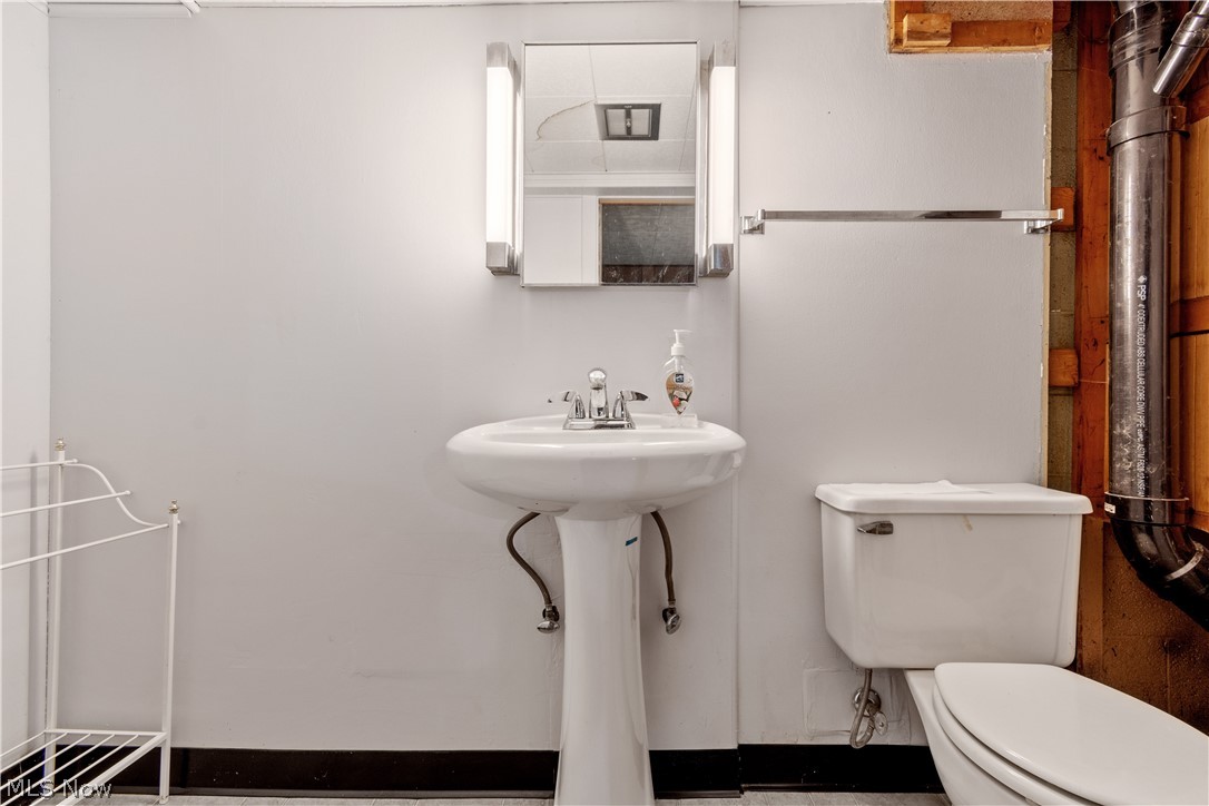 1724 Spring Valley Avenue Northwest Canton, OH 44708 - Photo 21 of 30 Bathroom featuring toilet