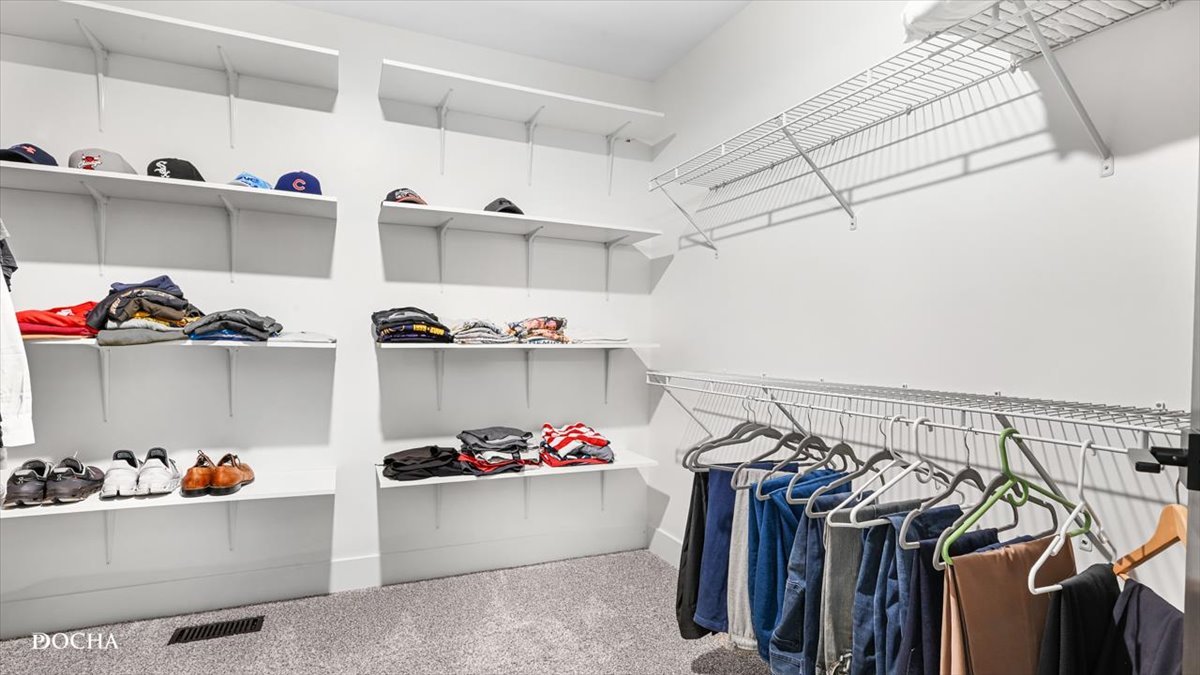 26827 Ashgate Crossing Plainfield, IL 60585 - Photo 13 of 31 a view of storage and utility room