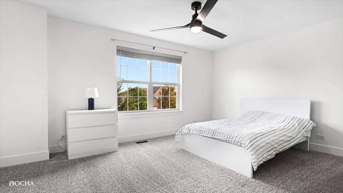 26827 Ashgate Crossing Plainfield, IL 60585 - Photo 14 of 31 a bedroom with a bed and a window