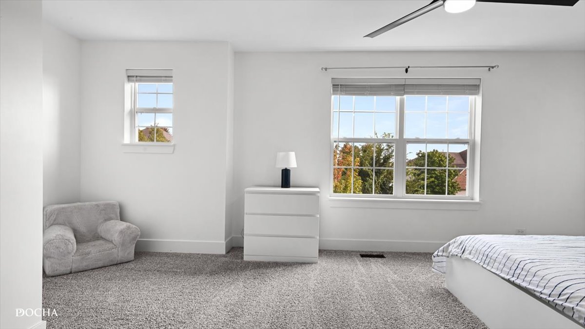 26827 Ashgate Crossing Plainfield, IL 60585 - Photo 15 of 31 a living room with furniture and a window